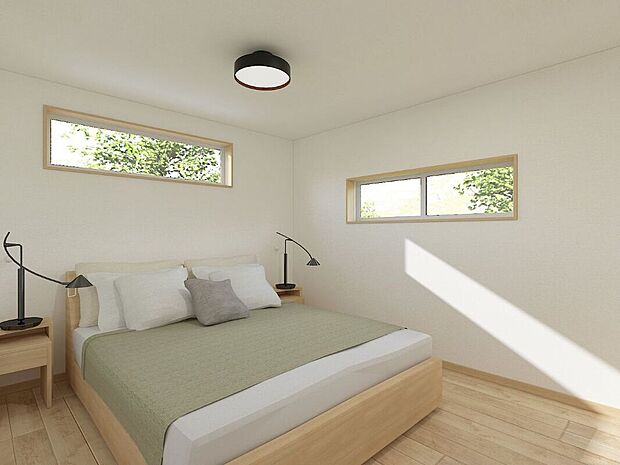 【主寝室】自然光が優しく差し込む主寝室。シンプルで温かみのあるデザインが、心地よいリラックス空間を作り出しています。毎日の疲れを癒し、穏やかなひとときを過ごすことができる、落ち着いた空間です。