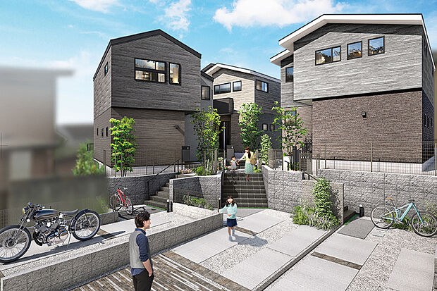 高低差や旗竿地を活かし、住民の繋がりを生む「結いの間」をデザイン。インターロッキングの共有地で街に一体感を出し、車の出入りもスマート。