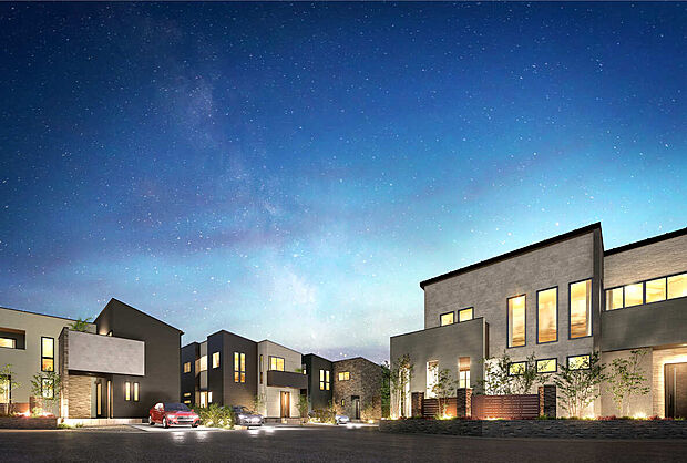 星降る夜空の下、上質な灯りに包まれた美しい街並み。洗練されたモダンデザインと緑豊かな植栽が調和し、静けさと気品に満ちた暮らしを演出します。夜も絵になるこの街は、家族の未来をやさしく照らす特別な場所。