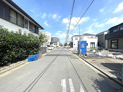 【外観写真】室内物干や対面式キッチンを備え、日々の家事動線に