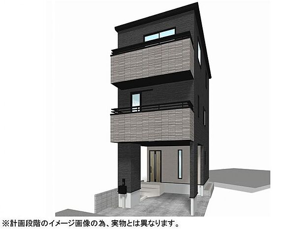 シックな黒とグレーを基調とした都会的な外観。木目調の玄関扉がアクセントに映える美しいデザインです。