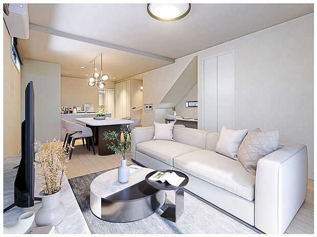 【1号棟リビング】階段下の空間を有効活用したスタディコーナーが、日常に遊び心を添えるLDK空間。