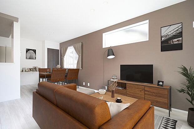 【LDKイメージ】厳選されたアクセントクロスが壁面に奥行きと表情を与え、洗練された雰囲気の上質なLDK空間を演出します。