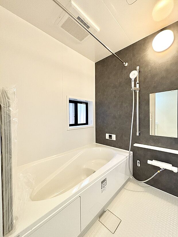 落ち着いた雰囲気でゆっくりお寛ぎいただけるバスルーム