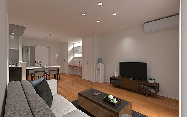 【木の温もりを感じるナチュラルモダンなLDK】キッチンまで見渡せる一体感のある広々リビング。温かみのある内装と落ち着いた照明で、家族みんながゆったりと寛げます。