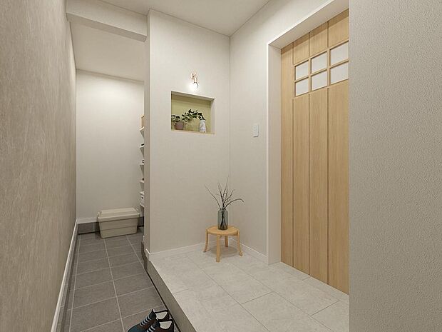 【玄関※完成予想パース(B)】階段下のスペースを賢く活用し、ベビーカーや靴をすっきりと収納できる土間収納を設けました。 機能性とデザイン性を両立した、スマートで心地よい玄関空間です。