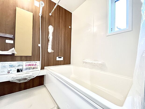 落ち着いた雰囲気でゆっくりお寛ぎいただけるバスルーム