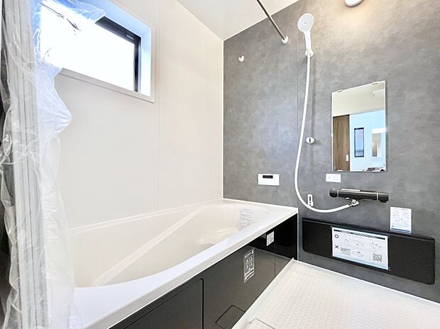 落ち着いた雰囲気でゆっくりお寛ぎいただけるバスルーム