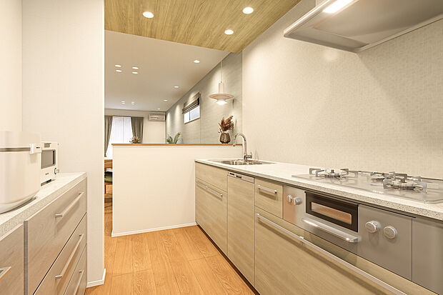 【キッチン完成予想図】T-6／家族の気配を感じつつ、しっかりと調理に集中できる仕様だから食事の準備も自分のペースで楽しめます。快適な家事を叶えるカップボードとの動線や距離感も、嬉しいポイントの1つです。