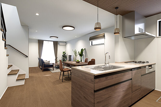 【キッチン完成予想図】T-7／キッチンはウォールナットの温かみのある色合いが、シャープな空間に温もりをプラス。吹抜けの開放感と明るい陽差しが、穏やかで上質なくつろぎのひと時をもたらします。