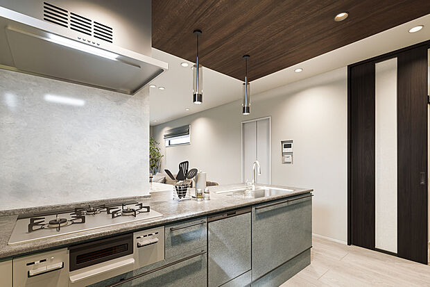 【キッチン完成予想図】T-2／洗練された空間を演出する人気のペニンシュラキッチンを採用。視線が抜ける開放感を持ちながら、コンロ周りのお手入れがしやすい実用的な設計です。リビングの家族を見守りながら、楽しくお料理ができます。