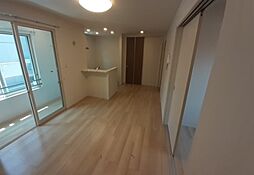 クオーレ 1階1LDKのリビング/ダイニング