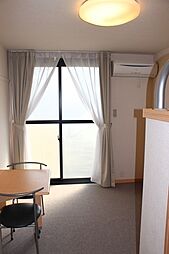 レオパレスアルカンシェル 2階1Kのリビング/ダイニング