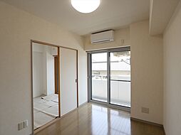 サンスクエア深田台　A棟 206 2階2Kのリビング/ダイニング