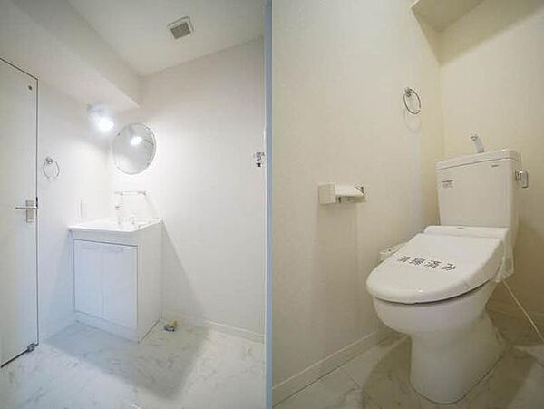 画像16:【洗面所＆トイレ】丸型の鏡がお洒落な洗面化粧台のある洗面脱衣所と、温水洗浄暖房便座付のトイレです。いずれも大理石調のクッションフロアを採用し、清潔感のある空間になりました♪