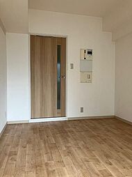 グローリア初穂聖蹟桜ヶ丘 103 1階ワンルームのリビング/ダイニング