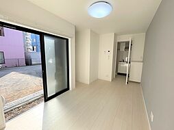 アザーレ・ソラ中河原 301. 3階1Kのリビング/ダイニング