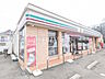 周辺：セブン-イレブン 日野高幡橋南店 (200m)