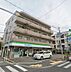 周辺：【コンビニエンスストア】ファミリーマート　尼崎大庄西町店まで369ｍ