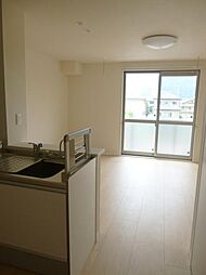 メゾン・ド・アンジェリーク 203 1階2LDKのリビング/ダイニング