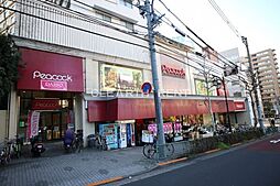 【スーパー】ピーコックストア 高輪魚籃坂店まで454ｍ