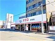 ナフコトミダ杉栄店 406m