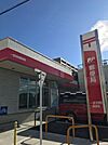 郵便局「一宮別明郵便局まで890m」