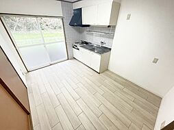 ハイステージ向谷　Ｂ棟 1階2DKのリビング/ダイニング