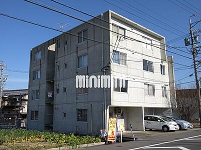 外観：コンクリート打ちっ放しマンション