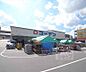 周辺：ホームセンターコーナン 葛野四条外大前店まで1007m