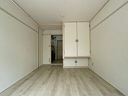 とみやグリーンレジデンス 113 1階ワンルームのリビング/ダイニング