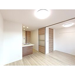 コンフォーティア宮田　A棟 1階1LDKのリビング/ダイニング