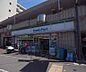 周辺：ファミリーマート紫明通店まで299m 閑静なエリアに溶け込むコンビニです