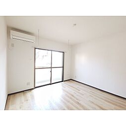 トップアスリートII 102 1階1Kのリビング/ダイニング