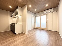 オランジュベール津住吉 102 1階1LDKのリビング/ダイニング