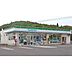 周辺：コンビニ「ファミリーマート津久居野村店まで809ｍ」