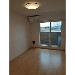 グランメゾンIII 203 2階2LDKの寝室