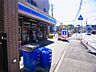 周辺：ローソン 松戸店（590m）