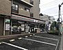 周辺：セブンイレブン 大宮日進駅西店（560m）