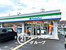 周辺：ファミリーマート枚方長尾谷町店 コンビニまで徒歩2分！急な必要品やお惣菜の買い出しにもすぐに対応できる驚きの近さで、多忙な現代人の毎日を力強くサポートしてくれる頼もしいパートナーです！ 130m