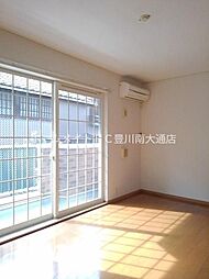 トミーハウス 1階1LDKのリビング/ダイニング