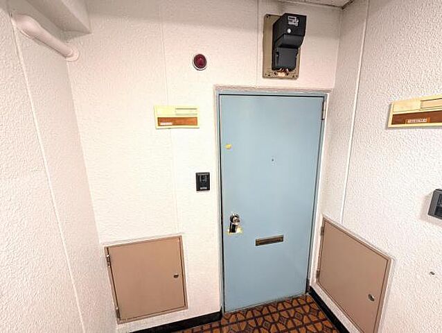 玄関 サンパークマンション鶯谷 6階/-