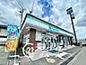 周辺：ファミリーマート上牧桜ヶ丘店 徒歩3分。 200m