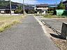 外観：進入路部分。当該物件から市道方面を撮影。