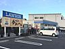 周辺：ローソン 綾瀬吉岡東三丁目店 徒歩15分。 1130m