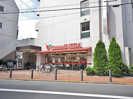コモディイイダ池袋立教通り店まで約168m