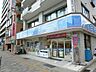 周辺：【コンビニエンスストア】ローソン津門大塚町店まで365ｍ