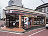 周辺：セブンイレブン 葛飾亀有5丁目店（377m）