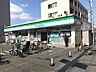 周辺：ファミリーマート 茨木中央通店（285m）