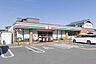 周辺：セブンイレブン 高槻安満中の町店（311m）